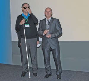 Gary Piper receiving his award from Ken Woodward