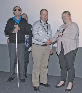 Timmy Cary of GE's Whitegate power station receiving his award from Jennifer Deeney